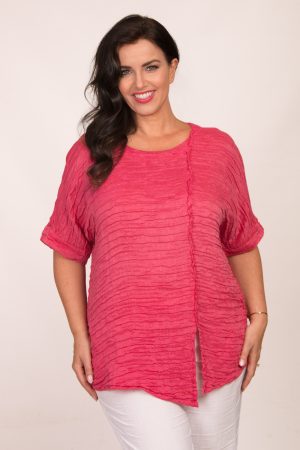 Our model is wearing Grizas frill detail short top in raspberry for Froxx Clothing plus sizes