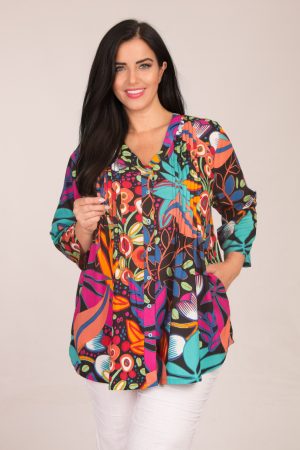 Our model is wearing Orientique Copacabana pleat shirt in black multi for Froxx Clothing plus sizes