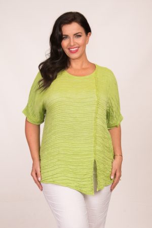 Our model is wearing Grizas frill detail short top in lime green for Froxx Clothing