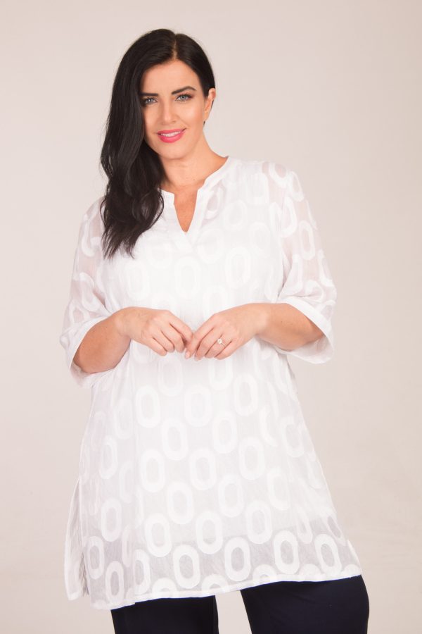 Our model is wearing See You sheer tunic in white for Froxx Clothing plus sizes