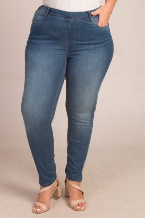 Our model is wearing Ciso Sofia slim leg jeans in denim for Froxx Clothing plus sizes