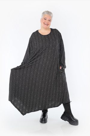 Our model is wearing AKH Vanilla jacquard jersey dress in black for Froxx Clothing plus sizes