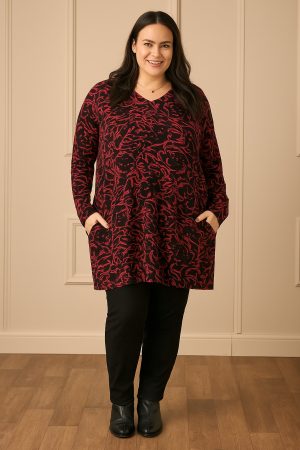 OUr model Zhana Paton is wearing Ciso floral tunic in black and red for Froxx Clothing plus size specialists