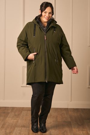 Our model is wearing Frandsen water repellant 3 in 1 jacket in bottle green for Froxx Clothing plus sizes boutique in Farnham