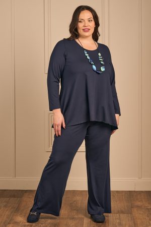 Our model is wearing Exelle Balo jersey palazzos in navy for Froxx Clothing